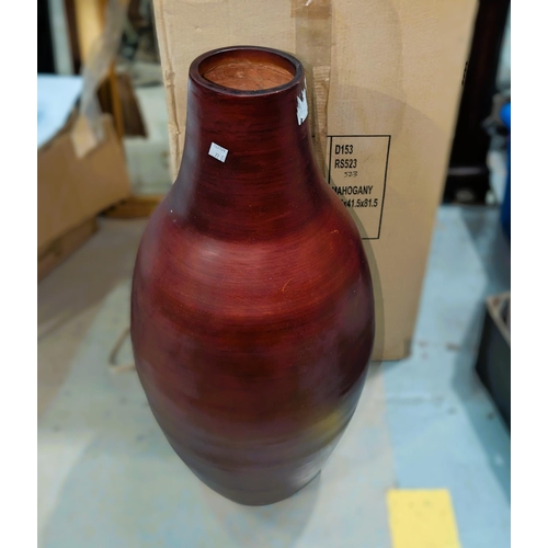 72D - A floor standing wooden vase 70cm 