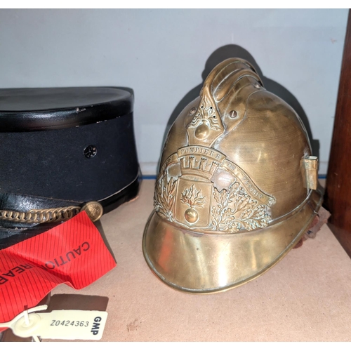 207A - A late 19th/ early 20th century brass fireman's helmet leather interior loose 