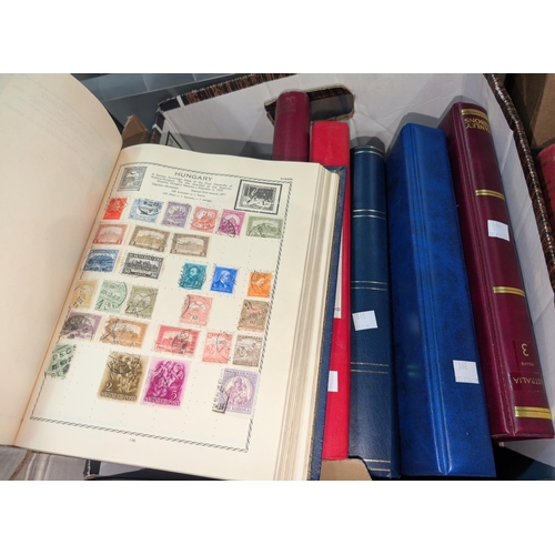 391 - A selection of world stamp albums.