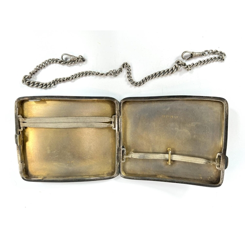 705 - A 1930's silver cased engine turned cigarette case and a silver watch Albert chain