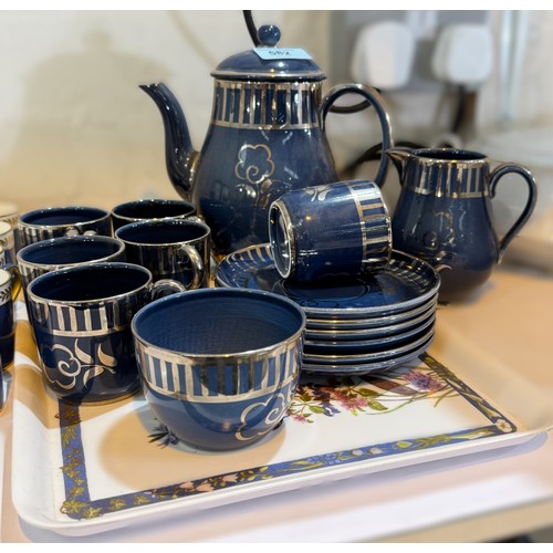 582 - An Art Deco Wedgwood coffee set dark blue ground with silver flower and line decoration 6 cups and s... 