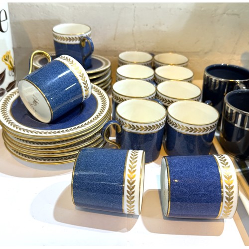 583 - A Wedgwood blue and gilt coffee service, 12 cups and saucers X9266