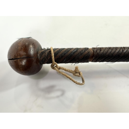 310 - A carved wooden and wire wrapped chief's knobkerrie