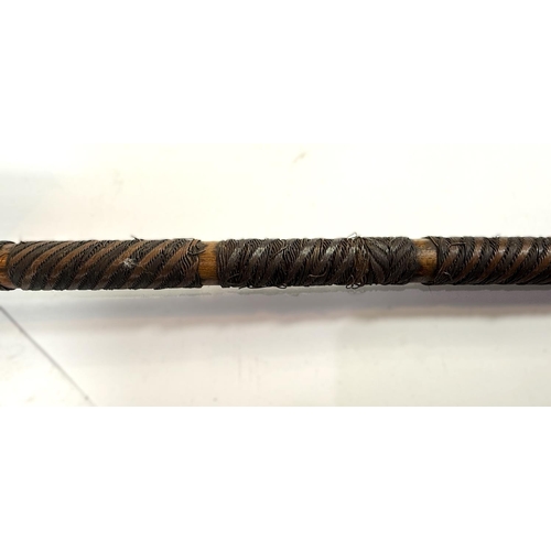 310 - A carved wooden and wire wrapped chief's knobkerrie