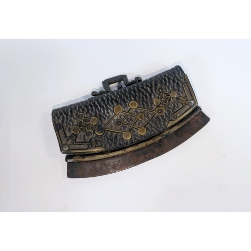 406 - A 19th Century Japanese tobacco pouch with brass decoration and a tobacco cutting signed