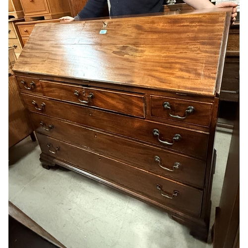 993 - A George III mahogany fall front bureau with fitted interior, 3 frieze and3 long drawers, on bracket... 