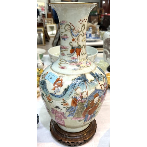 456 - A Chinese Famille Rose vase decorated with polychrome figures of people collecting flowers, with sea... 