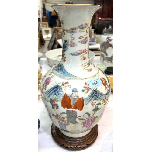 456 - A Chinese Famille Rose vase decorated with polychrome figures of people collecting flowers, with sea... 