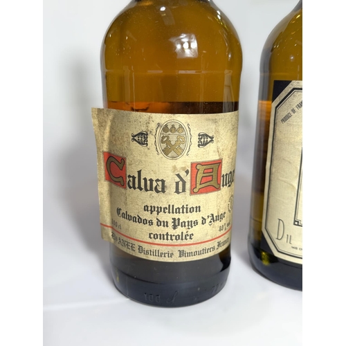 A bottle of Calvados Des Fins Gourmets Normands, 1 litre; a bottle