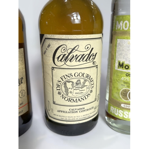 A bottle of Calvados Des Fins Gourmets Normands, 1 litre; a bottle