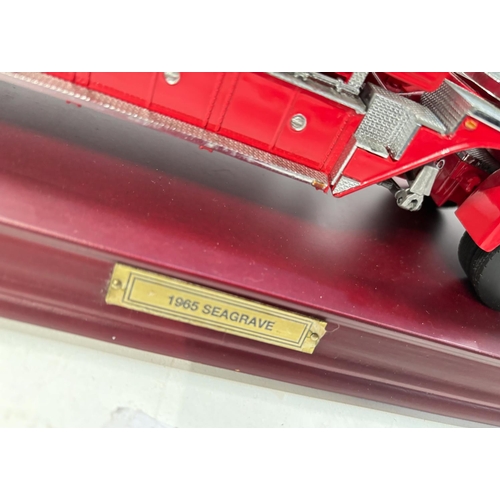 342 - Three large scale diecast vehicles, a fire engine, a tanker and a freighter.