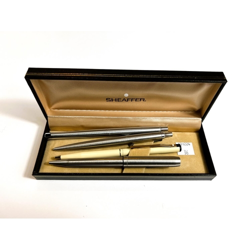 36 - A Sheaffer biro in box, 2 Parkers and a Papermate similar (no boxes)