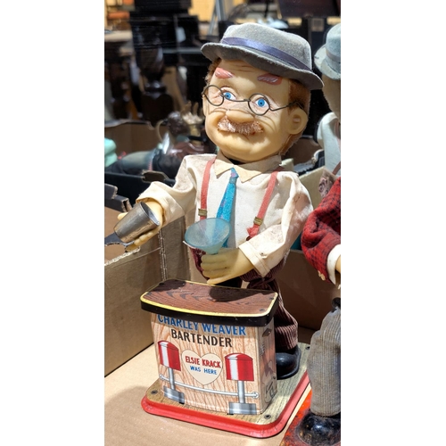 361 - A vintage Japanese Rosko battery operated toy smoking man; vintage tinplate battery operated Charley... 