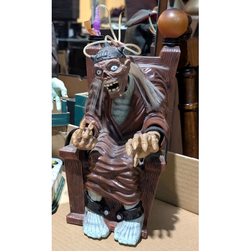 362 - A vintage Japanese Rosko 'Frankenstein' battery operated tinplate toy; battery operated 'Crypt Keepe... 