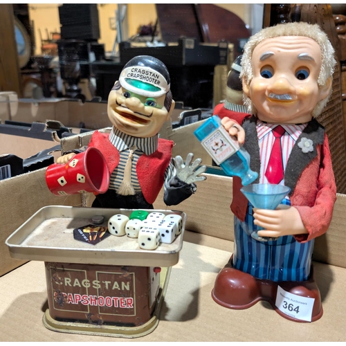 364 - A vintage Japanese battery operated tinplate bartender; a vintage Cragstan tinplate battery operated... 