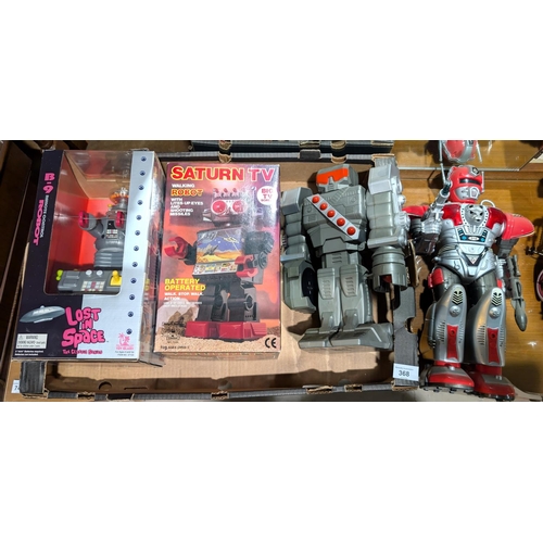 368 - A vintage boxed Saturn TV Walking Robot, Lost in Space Robot and other vintage robots.