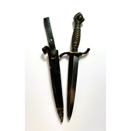 42 - A German hunting/commando-style dagger with brass handle and ball and claw terminal, marked 