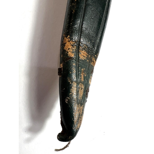 42 - A German hunting/commando-style dagger with brass handle and ball and claw terminal, marked 