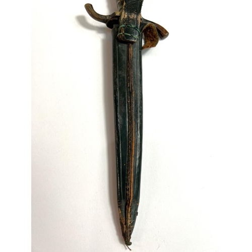 42 - A German hunting/commando-style dagger with brass handle and ball and claw terminal, marked 