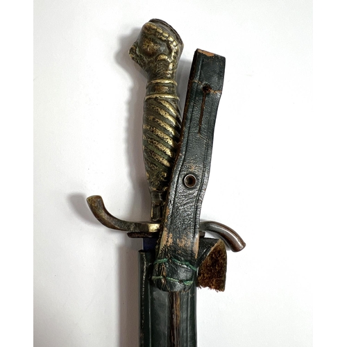 42 - A German hunting/commando-style dagger with brass handle and ball and claw terminal, marked 