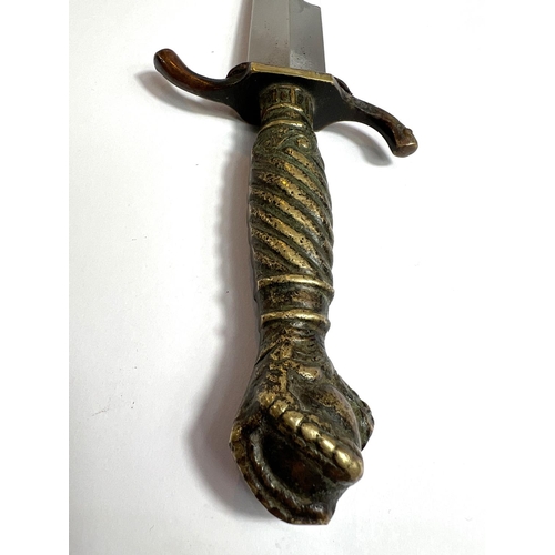 42 - A German hunting/commando-style dagger with brass handle and ball and claw terminal, marked 