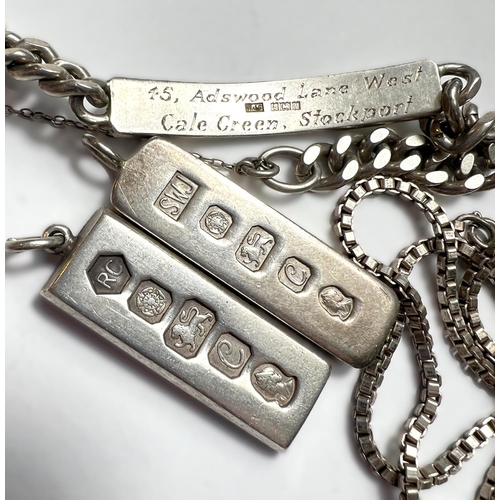 45 - Two hallmarked silver ingot pendants and an identity bracelet (3oz); various silver coloured arm ban... 