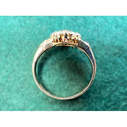 628 - A lady's yellow metal dress ring set with central old cut diamond,&nbsp; approx. 0.5ct surrounded by... 