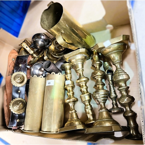 69 - Two pairs of brass candlesticks; brass shell case trench art, martingales with horse brasses.