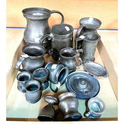 73 - A selection of 18th/19th Century pewter including mugs and graduating pub measures.