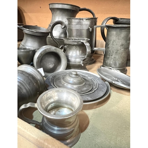 73 - A selection of 18th/19th Century pewter including mugs and graduating pub measures.