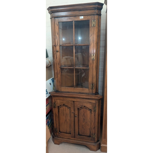 846 - A golden oak Titchmarsh and Goodwin style full height corner unit.