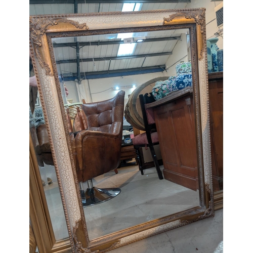 860 - A large rectangular wall mirror in 