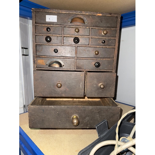 1 - A 19th century collector's cabinet with 14 variously shaped drawers with different handles, 45 x 32c... 