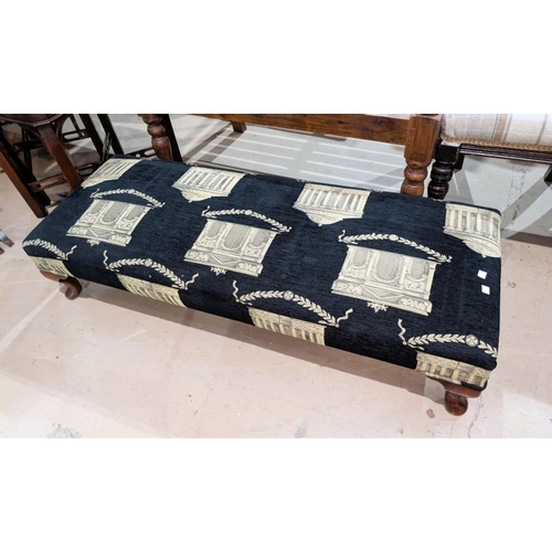 849 - A long low footstool in classical design upholstery; a double bed head in beige upholstery.