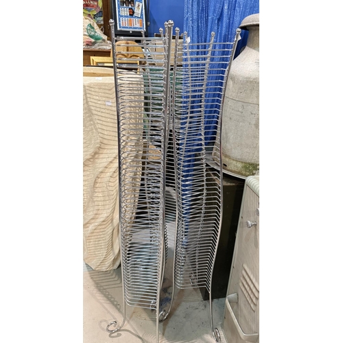 59 - A chrome wine rack and two similar CD stands + a two tier plant stand.