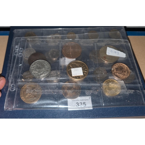 335 - A set of 16 Brazilian 1 real coins commemorating the Rio Olympics and a selection of tokens.