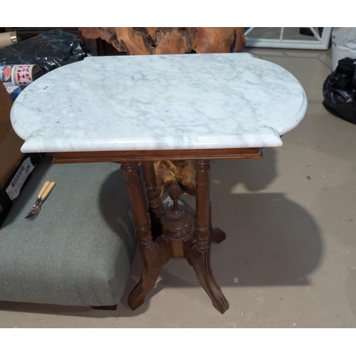 854 - A Victorian style marble top pedestal occasional table with spare top.