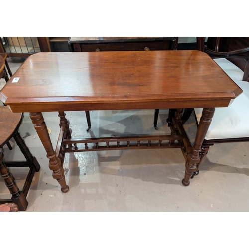 989 - A mahogany aesthetic style movement table and an octagonal wine table.