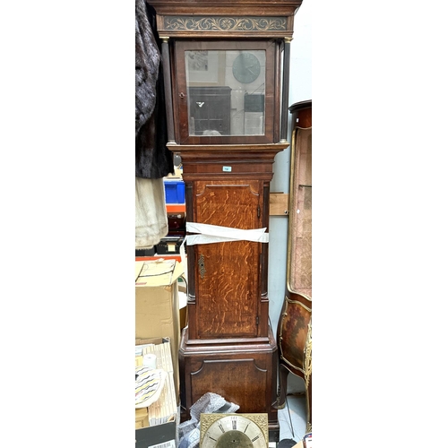 985 - An 18th Century oak longcase clock with cross banded decorated, the door with reeded columns, 1/4 re... 