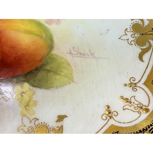 696 - Royal Worcester: an oval porcelain fruit dish decorated with peaches and blackberries, signed A SHUC... 