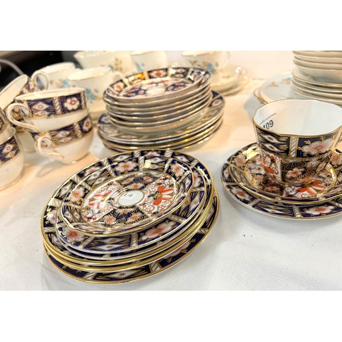 635 - A Royal Crown Derby cup and saucer, other Royal Crown Derby saucers, a similar Imari pattern set and... 