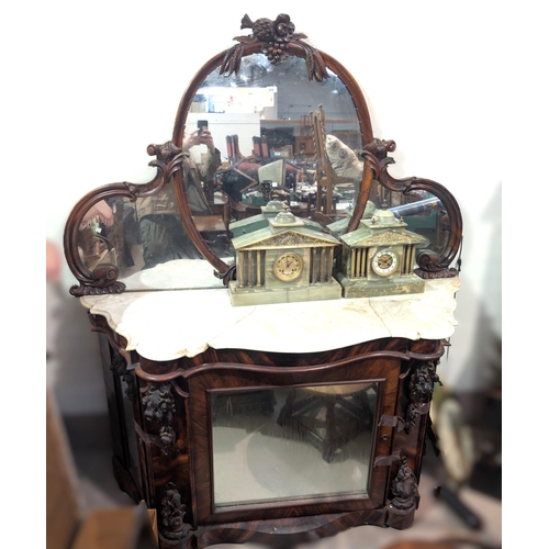 984B - A Victorian simulated zebra wood mirror back chiffonier, the raised oval back with carved fruit and ... 