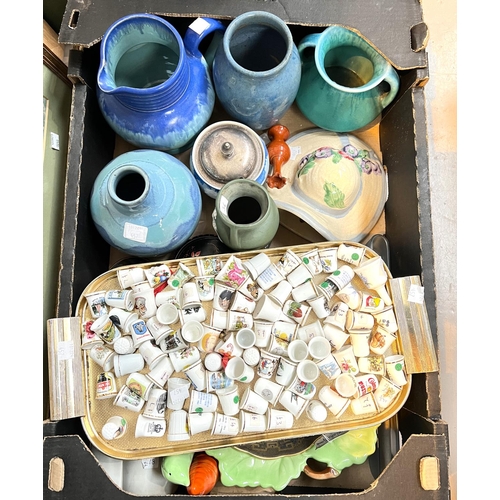 650 - A selection of coloured glassware and a collection of china thimbles.