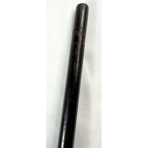 10 - A 19th Century carved ivory ebonised stick with carved ivory handle of penis form, 88cms.