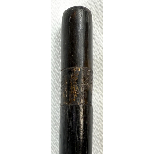 10 - A 19th Century carved ivory ebonised stick with carved ivory handle of penis form, 88cms.