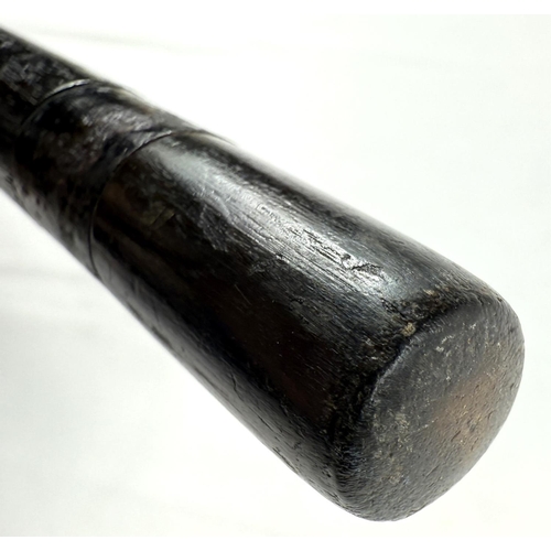 10 - A 19th Century carved ivory ebonised stick with carved ivory handle of penis form, 88cms.