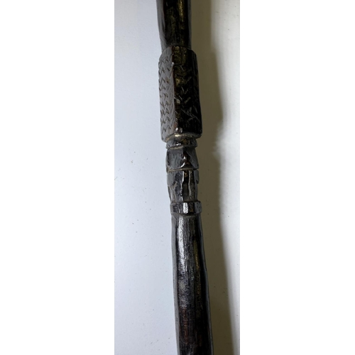 112 - A 19th Century stick in the form of a tribal spear with bronze horse's fetlock handle, 91cm.