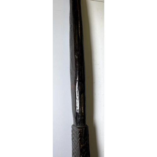 112 - A 19th Century stick in the form of a tribal spear with bronze horse's fetlock handle, 91cm.