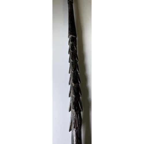 112 - A 19th Century stick in the form of a tribal spear with bronze horse's fetlock handle, 91cm.