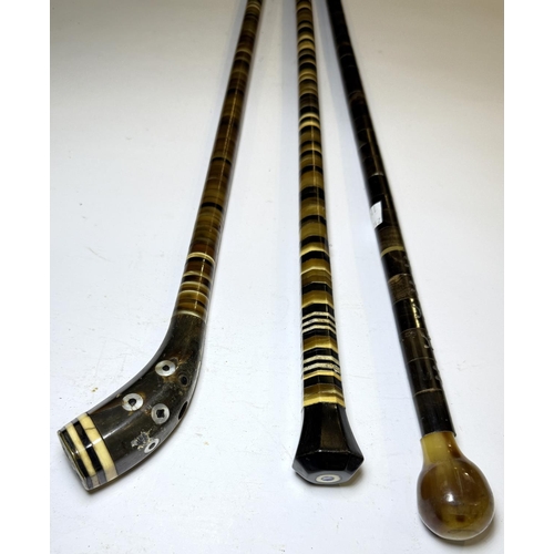 115 - Three sectional horn walking canes, probably Indian, circa 1900, 86-91cm (3).